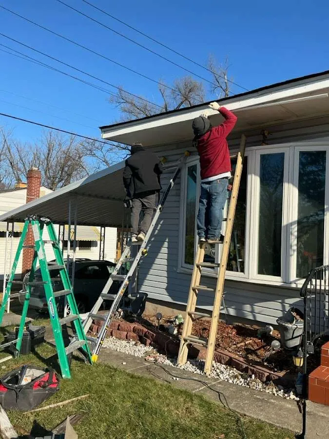Restoration crew performing exterior repair in Brandon